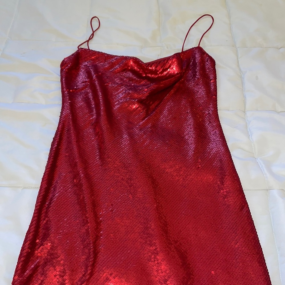 Red sequined mini dress with a scoop back